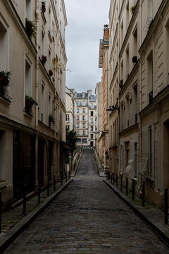 Quiet cobblestone street in a Paris neighborhood 