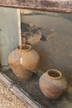 Clay pots and historic colonial architecture