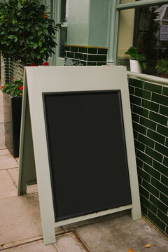 Blank A-Frame Sign Outside Shop
