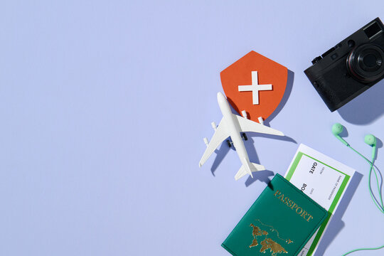 Airline boarding pass. Summer travel with suitcase.