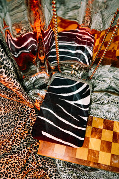 Stylish black and white zebra print purse on textured animal prints