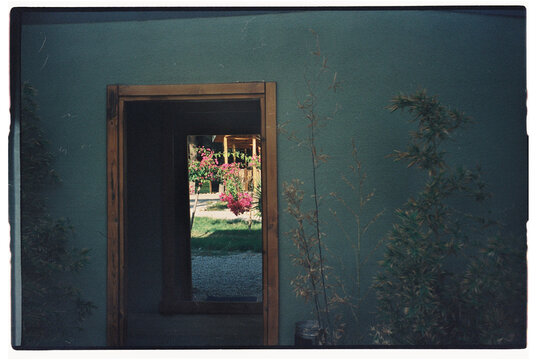 The view through an open doorway on a mirror 