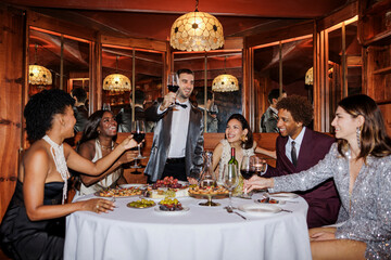 Happy friends making a toast together, enjoying new year's eve ugc