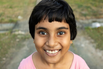 Happy and cheerful girl close up portrait