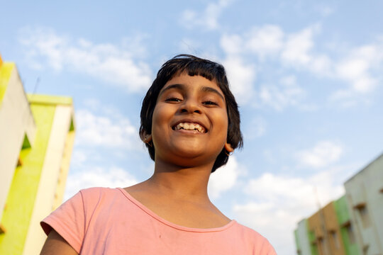 Happy and cheerful girl close up portrait