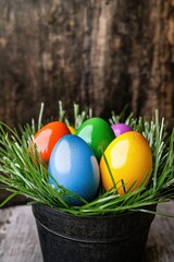 Fototapeta premium A black bucket filled with colorful Easter eggs