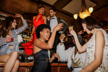 Friends celebrating new year's eve at nightclub ugc