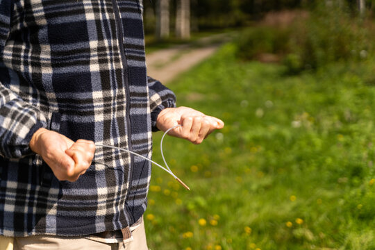 Man Dowsing for Water