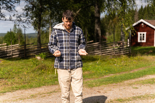 Man Dowsing for Water