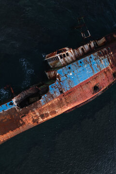 Close up aerial view of a ship wreck.