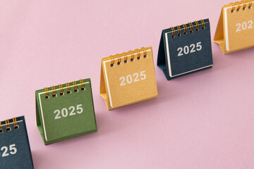 2025 calendars on pink background