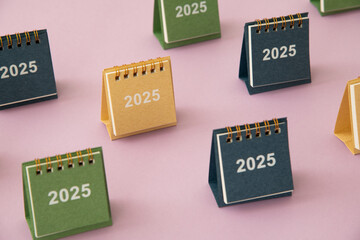 2025 calendars on pink background