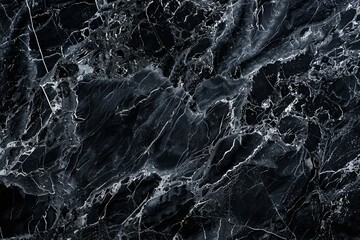 Photo of Deep black marble pattern with white veins. Background texture for backdrops or mapping