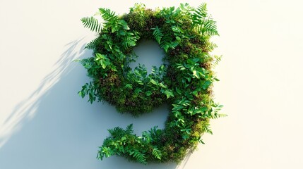 Number 9 made of green moss and ferns.