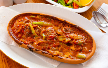 Izmir kofte, turkish dish of spicy meatballs served in tomato sauce