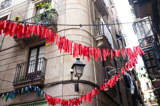 Cozy moody street view with lights and colourful festival decoration