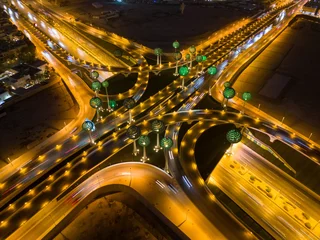 Fototapete Drone photo of busy motorway The Green Field Riyadh KSA. Night. © Prace snu