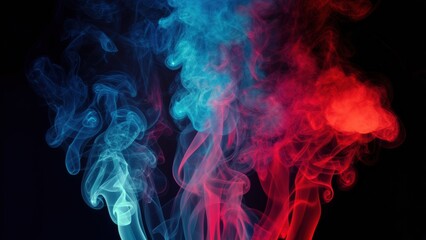 Colorful smoke swirling in patterns against a dark background during nighttime