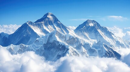 Obraz premium Majestic mountain peaks rise above clouds showcasing strength and grandeur in a breathtaking landscape