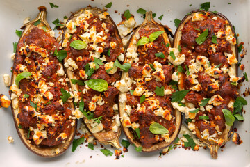 Italian Stuffed and Loaded Baked Eggplant Entree with Spicy Sausage, Parsley, Basil, Feta Cheese, Marinara Sauce