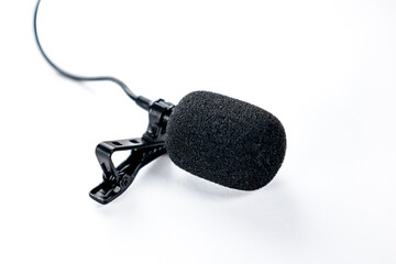 Compact tie clip microphone for interviews with pop filter. Concept: Audio, professional sound, sound.