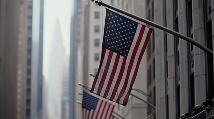Two American flags hung from a street light, symbolizing patriotism and national pride