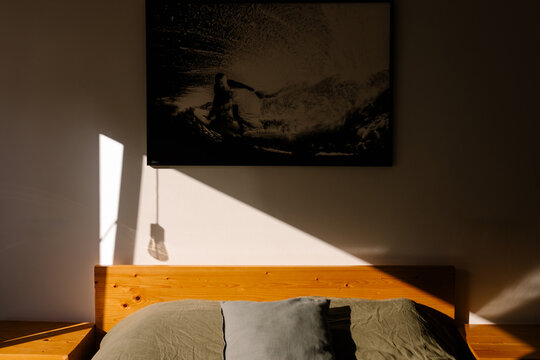 Sunlight coming through a window softly illuminates a room