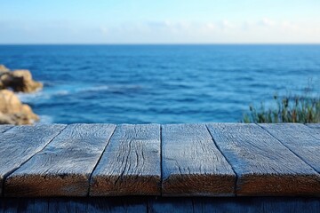 A wooden table with a stunning ocean view, perfect for a beachside cafe or outdoor dining setting