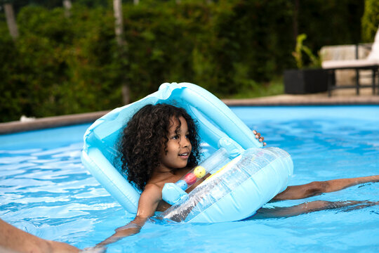 Girl in the swimming pool