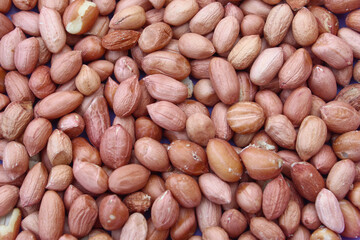 texture and background of raw peeled peanuts close up