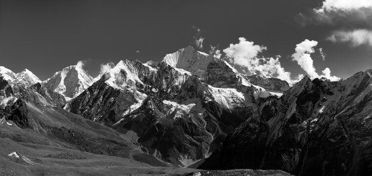 A monochrome image of the mountain Range from the peak of Tsergo Ri.