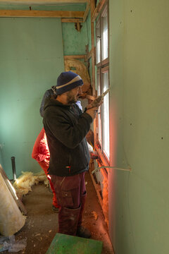 Tradesmen renovating bathroom