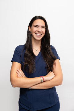 Confident Female Medical Professional Smiling in Uniform