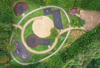 Aerial View of Colorful Park with Playgrounds and Paths