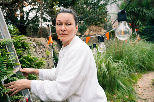 Woman in Outdoor Garden Setting