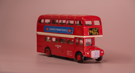 London double decker bus model. Famous vintage london bus model toy golden view. Iconic Bus