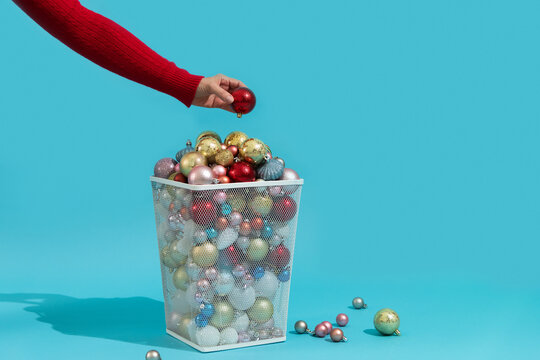 Christmas presents and gifts in trash can. Over consumption 