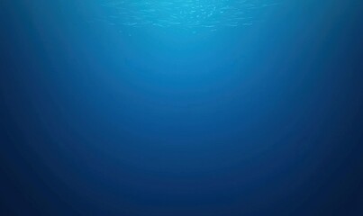 Obraz premium Deep blue ocean scene with sunlight filtering from the surface, ideal for underwater backgrounds.