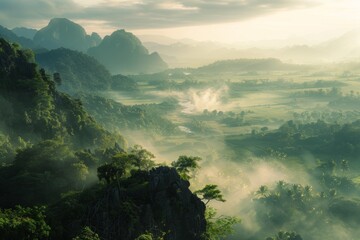 A laptop, mobile on wooden table with sunrise and mountain fog background in morning. A start of new day. Freelance business concept.