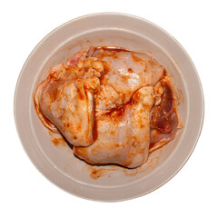 Chicken thighs in marinade.Chicken in marinade background.Marinated chicken with spices.