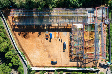 Aerial View of Active Construction Site with Metal Framework