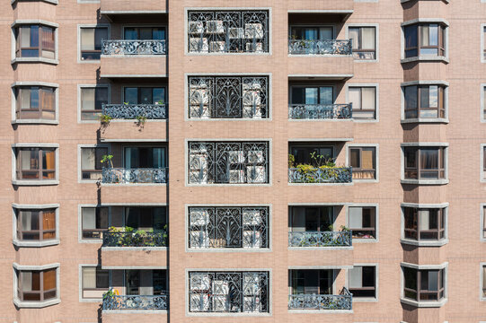 Elegant Balconies with Air Conditioning Units on Residential Bui