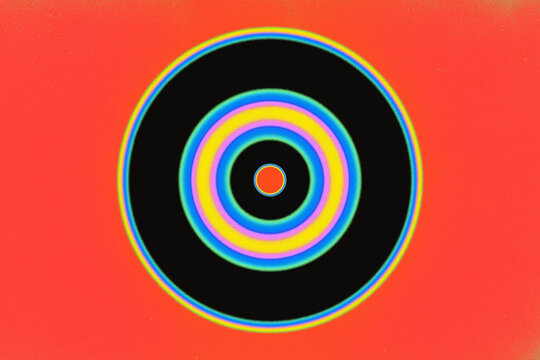 Colourful Concentric Circles on Vibrant Red Background