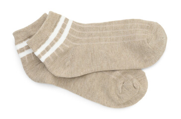 Pair of soft socks isolated on white, top view