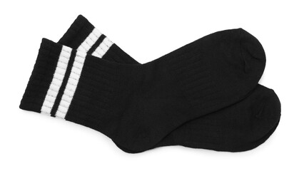 Pair of soft socks isolated on white, top view