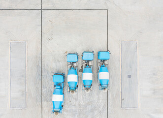 Aerial View of Blue Concrete Mixer Trucks on Construction Site