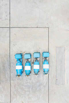 Aerial View of Blue Concrete Mixer Trucks on Construction Site