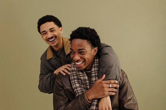 Two happy friends smiling at camera