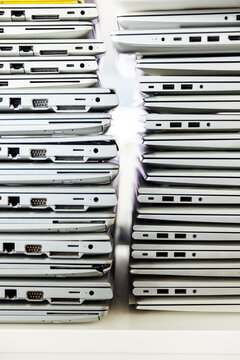Broken old laptops stacked