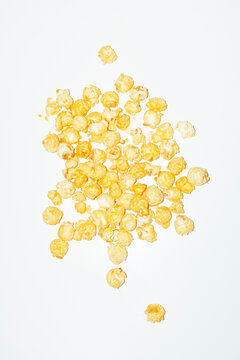 Cheddar cheese flavoured popcorn snacks with hard direct flashlight